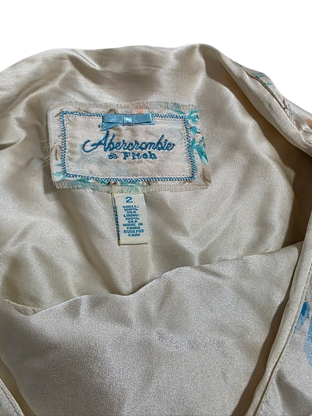 Abercrombie vintage cream silk miniskirt with blue ribbon, floral print, and gem - Picture 3 of 4